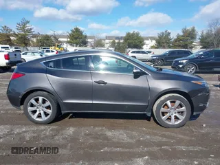 2010 Acura ZDX Tech Pkg with VIN 2HNYB1H44AH501894, listed as a IAAI auction lot 41606969 with 210,308 mi miles. Bid and sale history available at carsss.com. Image 13.