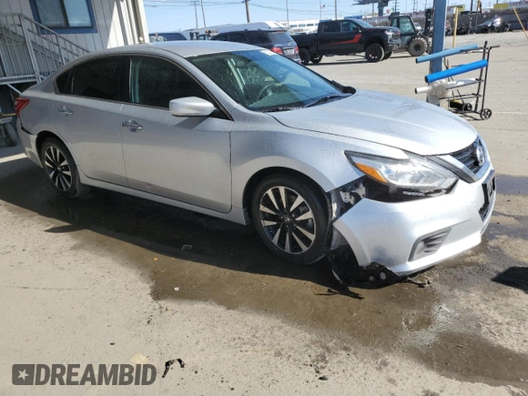 2018 Nissan Altima SV with VIN 1N4AL3AP8JC207041, listed as a Copart auction lot 51521575 with 127,482 mi miles and Salvage Title. Bid and sale history available at DreamBid. Image 4.