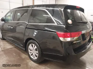 2016 Honda Odyssey EX-L with VIN 5FNRL5H61GB045982, listed as a IAAI auction lot 41587450 with 106,381 mi miles. Bid and sale history available at carsss.com. Image 3.