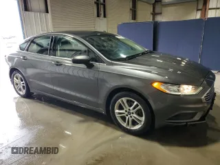 2018 Ford Fusion SE z VIN 3FA6P0H79JR111709, wystawiony jako Copart lot #52972855 z przebiegiem 116 442 mil mil oraz Czysty tytuł • Clean title. Historia ofert i sprzedaży dostępna na DreamBid. Obrazek 4.