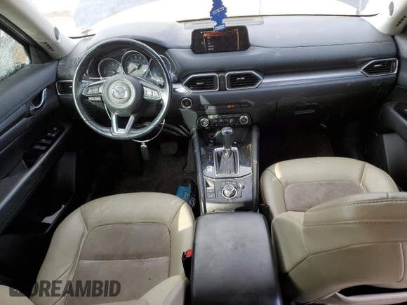 2017 Mazda CX-5 Touring z VIN JM3KFBCL7H0212955, wystawiony jako Copart lot #46096525 z przebiegiem 94 606 mil mil oraz Szkody całkowita. Historia ofert i sprzedaży dostępna na DreamBid. Obrazek 8.