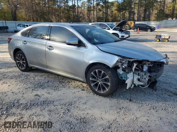 2018 Toyota Avalon XLE with VIN 4T1BK1EB8JU285829, listed as a Copart auction lot 46677905 with 184,542 mi miles and Salvage Title. Bid and sale history available at carsss.com. Image 4.