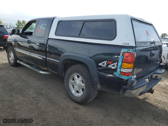 2004 GMC Sierra 1500 SLT with VIN 1GTEK19T14E310475, listed as a Copart auction lot 71742464 with 0 mi miles and Salvage Title. Bid and sale history available at carsss.com. Image 2.