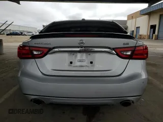 2016 Nissan Maxima SL with VIN 1N4AA6AP4GC416745, listed as a Copart auction lot 52789885 with 107,102 mi miles and Salvage Title. Bid and sale history available at DreamBid. Image 6.