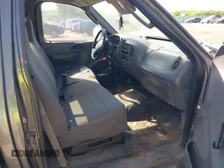 2003 Ford F-150 XL with VIN 1FTRF17273NB64646, listed as a IAAI auction lot 41986850 with 180,601 mi miles. Bid and sale history available at carsss.com. Image 5.