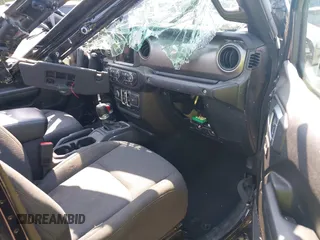 2023 Jeep Gladiator Sport S z VIN 1C6HJTAG2PL544870, wystawiony jako IAAI lot #42155013 z przebiegiem Nie podano mil oraz . Historia ofert i sprzedaży dostępna na DreamBid. Obrazek 5.