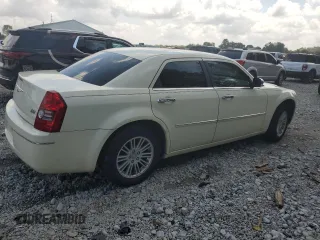 2010 Chrysler 300 Touring with VIN 2C3CA5CV3AH184687, listed as a Copart auction lot 68006024 with 122,272 mi miles and Salvage Title. Bid and sale history available at DreamBid. Image 3.