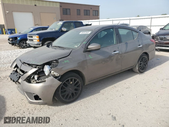 2016 Nissan Versa SV with VIN 3N1CN7AP9GL810018, listed as a Copart auction lot 56853565 with 123,197 mi miles and Salvage title. Bid and sale history available at DreamBid. Image 1.