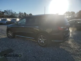 2015 Dodge Durango Citadel with VIN 1C4RDHEG2FC702604, listed as a Copart auction lot 82533594 with 135,798 mi miles and Salvage title. Bid and sale history available at DreamBid. Image 2.
