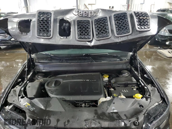 2020 Jeep Cherokee Trailhawk with VIN 1C4PJMBX9LD582951, listed as a Copart auction lot 60152935 with 61,448 mi miles and Salvage title. Bid and sale history available at DreamBid. Image 12.