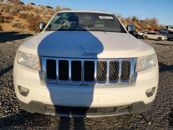 2011 Jeep Grand Cherokee Overland with VIN 1J4RS6GG9BC629680, listed as a Copart auction lot 83861474 with 175,547 mi miles and Salvage Title. Bid and sale history available at DreamBid. Image 5.