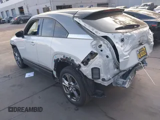 2022 Mazda MX-30 Premium Plus z VIN JM1DRADB6N0100295, wystawiony jako IAAI lot #41885035 z przebiegiem 32 616 mil mil oraz . Historia ofert i sprzedaży dostępna na DreamBid. Obrazek 3.