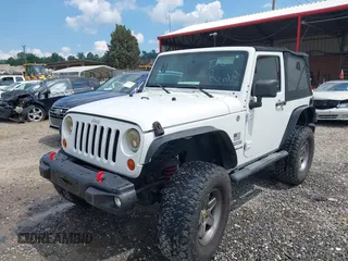 2012 Jeep Wrangler Sport z VIN 1C4AJWAG5CL171961, wystawiony jako IAAI lot #42590232 z przebiegiem 126 372 mil mil oraz . Historia ofert i sprzedaży dostępna na DreamBid. Obrazek 17.