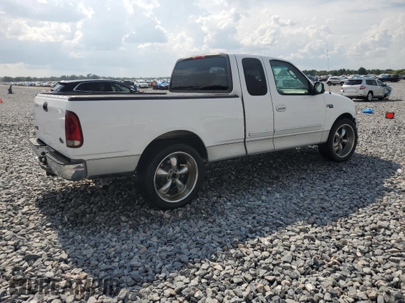 2002 Ford F-150 XL with VIN 1FTRX17272NB01218, listed as a Copart auction lot 61336795 with 201,972 mi miles and Salvage title. Bid and sale history available at DreamBid. Image 3.