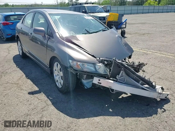 2009 Honda Civic LX z VIN 19XFA16559E020457, wystawiony jako Copart lot #58721185 z przebiegiem Nie podano mil oraz Szkoda całkowita • Salvage title. Historia ofert i sprzedaży dostępna na DreamBid. Obrazek 14.