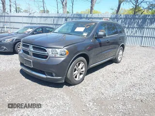 2011 Dodge Durango Crew with VIN 1D4SE4GT6BC664597, listed as a IAAI auction lot 42142568 with 202,275 mi miles and . Bid and sale history available at carsss.com. Image 2.