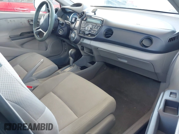 2010 Honda Insight LX with VIN JHMZE2H54AS021815, listed as a IAAI auction lot 42259951 with 137,436 mi miles and . Bid and sale history available at DreamBid. Image 5.