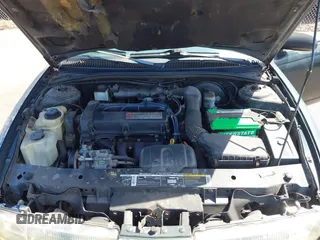 1999 Saturn SL z VIN 1G8ZK5274XZ351289, wystawiony jako IAAI lot #41734679 z przebiegiem 140 006 mil mil oraz . Historia ofert i sprzedaży dostępna na DreamBid. Obrazek 10.