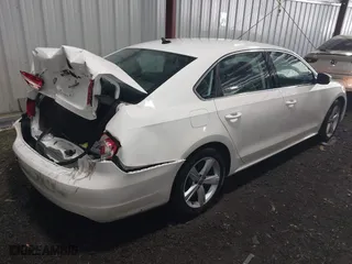 2013 Volkswagen Passat SE w/Sunroof with VIN 1VWBH7A35DC111003, listed as a IAAI auction lot 41991990 with 142,103 mi miles. Bid and sale history available at carsss.com. Image 4.