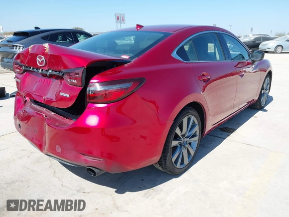 2020 Mazda 6 Grand Touring with VIN JM1GL1TY7L1511054, listed as a IAAI auction lot 41734848 with 70,573 mi miles and . Bid and sale history available at carsss.com. Image 4.