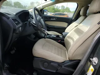 2015 Ford Edge SE with VIN 2FMTK3G93FBB43069, listed as a Copart auction lot 56537065 with 161,888 mi miles and Salvage title. Bid and sale history available at DreamBid. Image 7.