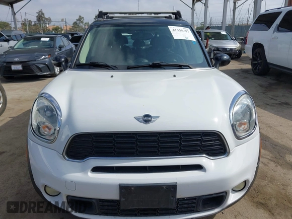 2013 MINI Countryman S with VIN WMWZC3C55DWP24628, listed as a IAAI auction lot 42558387 with 169,269 mi miles and . Bid and sale history available at DreamBid. Image 12.