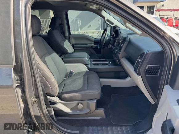 2019 Ford F-150 XL with VIN 1FTEW1CP1KKF22890, listed as a Copart auction lot 61813095 with 63,774 mi miles and Salvage title. Bid and sale history available at DreamBid. Image 7.