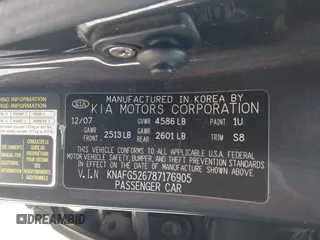 2008 Kia Rondo LX with VIN KNAFG526787176905, listed as a IAAI auction lot 41311694 with 161,161 mi miles. Bid and sale history available at carsss.com. Image 9.