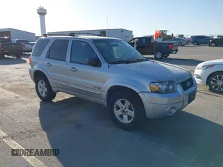 2006 Ford Escape Hybrid with VIN 1FMCU96H96KA25796, listed as a IAAI auction lot 41796914 with 119,809 mi miles and . Bid and sale history available at DreamBid. Image 1.