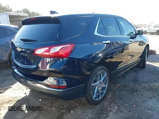 2020 Chevrolet Equinox LT with VIN 3GNAXKEV8LS679097, listed as a IAAI auction lot 41453201 with 59,105 mi miles and . Bid and sale history available at carsss.com. Image 4.