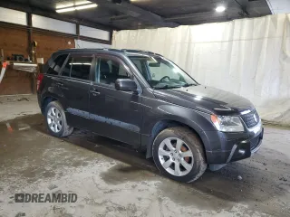 2012 Suzuki Grand Vitara Limited z VIN JS3TD0D79C4100640, wystawiony jako Copart lot #58167975 z przebiegiem 138 376 mil mil oraz Tytuł czysty. Historia ofert i sprzedaży dostępna na DreamBid. Obrazek 4.