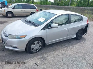 2010 Honda Insight LX with VIN JHMZE2H52AS038807, listed as a IAAI auction lot 42120846 with 242,816 mi miles and . Bid and sale history available at DreamBid. Image 2.