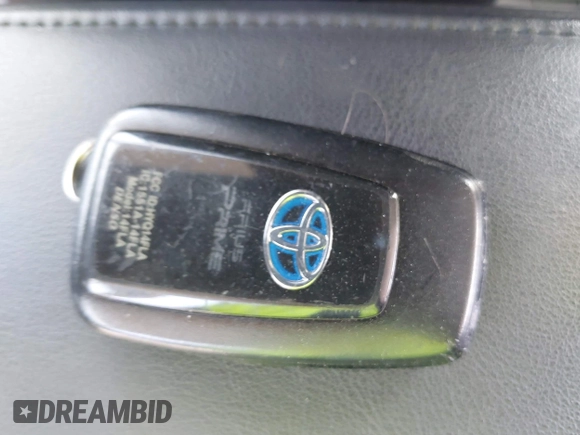 2022 Toyota Prius LE z VIN JTDKAMFP3N3202936, wystawiony jako IAAI lot #42238577 z przebiegiem 38 065 mil mil oraz . Historia ofert i sprzedaży dostępna na DreamBid. Obrazek 11.