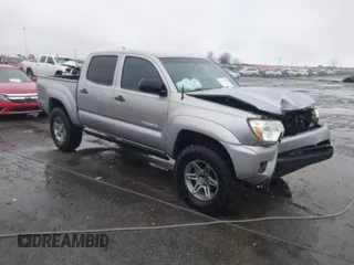 2014 Toyota Tacoma with VIN 3TMLU4EN2EM161239, listed as a IAAI auction lot 41536944 with 136,299 mi miles. Bid and sale history available at carsss.com. Image 1.