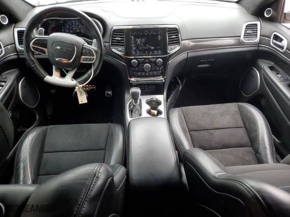 2021 Jeep Grand Cherokee SRT with VIN 1C4RJFDJ1MC561144, listed as a Copart auction lot 83961214 with 49,989 mi miles and Salvage Title. Bid and sale history available at carsss.com. Image 8.