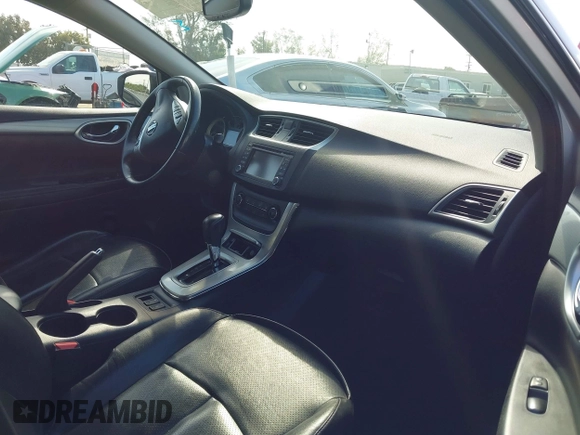 2015 Nissan Sentra S with VIN 3N1AB7AP3FY311829, listed as a IAAI auction lot 41903859 with 181,519 mi miles and . Bid and sale history available at DreamBid. Image 5.