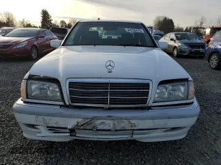 2000 Mercedes-Benz C 230 Kompressor with VIN WDBHA24G7YA822415, listed as a Copart auction lot 44250475 with 180,311 mi miles and Salvage Title. Bid and sale history available at carsss.com. Image 5.
