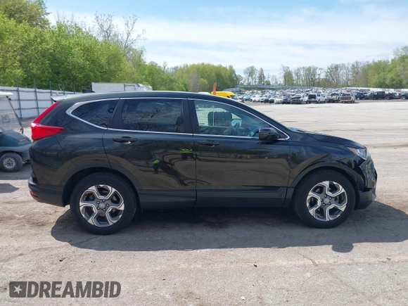 2018 Honda CR-V EX-L z VIN 7FARW2H82JE021578, wystawiony jako IAAI lot #42215280 z przebiegiem 82 571 mil mil oraz . Historia ofert i sprzedaży dostępna na DreamBid. Obrazek 13.