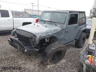2015 Jeep Wrangler Sport with VIN 1C4AJWAG0FL712581, listed as a IAAI auction lot 41612394 with NaN miles. Bid and sale history available at carsss.com. Image 17.