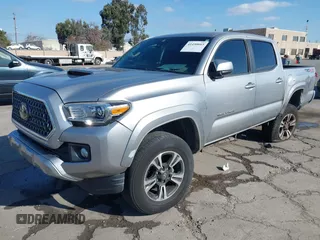 2018 Toyota Tacoma SR with VIN 3TMCZ5AN6JM185891, listed as a IAAI auction lot 41450665 with 53,749 mi miles and . Bid and sale history available at DreamBid. Image 18.