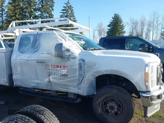 2023 Ford F-250 XL with VIN 1FT7X2BAXPED71157, listed as a IAAI auction lot 41265426 with 23,072 mi miles and . Bid and sale history available at DreamBid. Image 6.