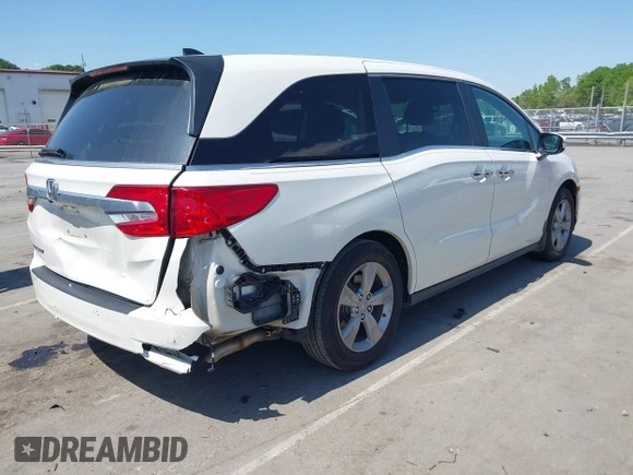 2019 Honda Odyssey EX-L with VIN 5FNRL6H76KB101969, listed as a IAAI auction lot 41985816 with 107,309 mi miles. Bid and sale history available at carsss.com. Image 4.