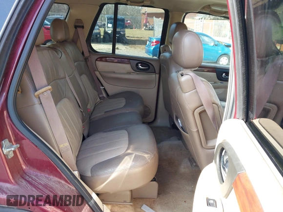 2004 GMC Envoy SLE with VIN 1GKDS13S342287315, listed as a IAAI auction lot 41486715 with 186,129 mi miles. Bid and sale history available at carsss.com. Image 8.