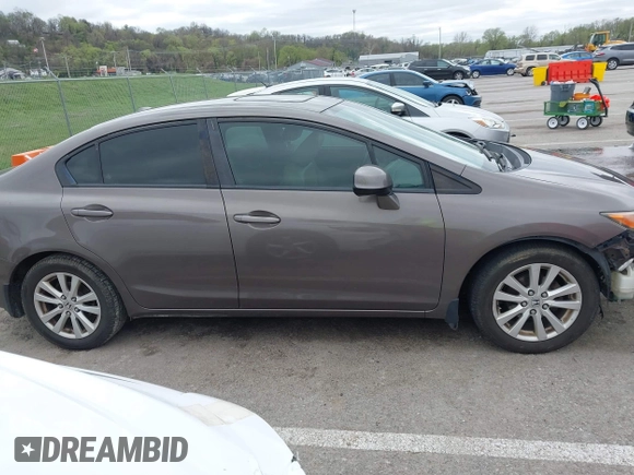 2012 Honda Civic EX-L with VIN 2HGFB2F95CH516460, listed as a IAAI auction lot 41897905 with 222,739 mi miles and . Bid and sale history available at DreamBid. Image 14.