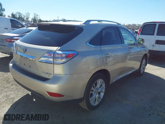 2011 Lexus RX 450h with VIN JTJBC1BAXB2420753, listed as a IAAI auction lot 41823358 with 102,714 mi miles and . Bid and sale history available at DreamBid. Image 4.