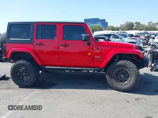 2016 Jeep Wrangler Unlimited Sahara with VIN 1C4BJWEG9GL194499, listed as a IAAI auction lot 42519265 with 84,432 mi miles and . Bid and sale history available at DreamBid. Image 13.