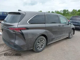 2021 Toyota Sienna LE with VIN 5TDKRKEC9MS034194, listed as a IAAI auction lot 42552990 with 21,633 mi miles and . Bid and sale history available at DreamBid. Image 4.