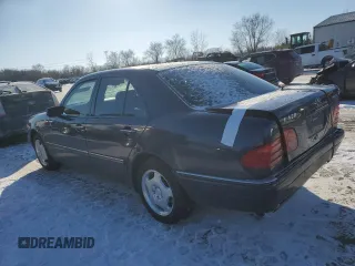 1997 Mercedes-Benz E-Class with VIN WDBJF72F8VA268145, listed as a Copart auction lot 86351464 with 94,324 mi miles and Salvage Title. Bid and sale history available at carsss.com. Image 2.