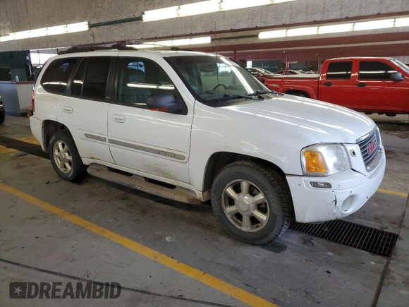 2002 GMC Envoy SLT with VIN 1GKDT13S622231265, listed as a Copart auction lot 45037215 with 213,069 mi miles and Salvage Title. Bid and sale history available at carsss.com. Image 4.