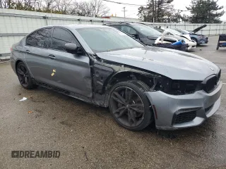 2018 BMW 5 Series M550i xDrive with VIN WBAJB9C54JB286707, listed as a Copart auction lot 49158435 with 74,307 mi miles and Salvage title. Bid and sale history available at DreamBid. Image 4.